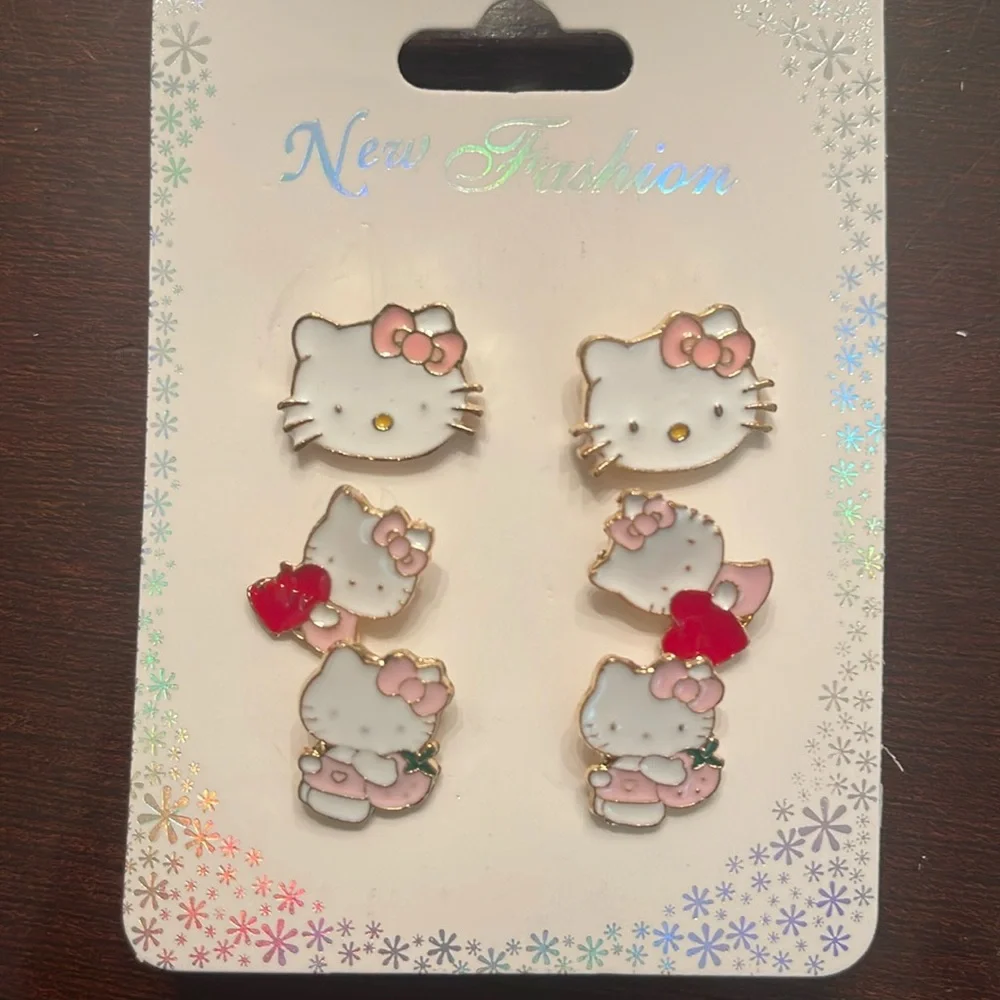Hello Kitty nwt Earrings Set - three pairs light pink and gold tone